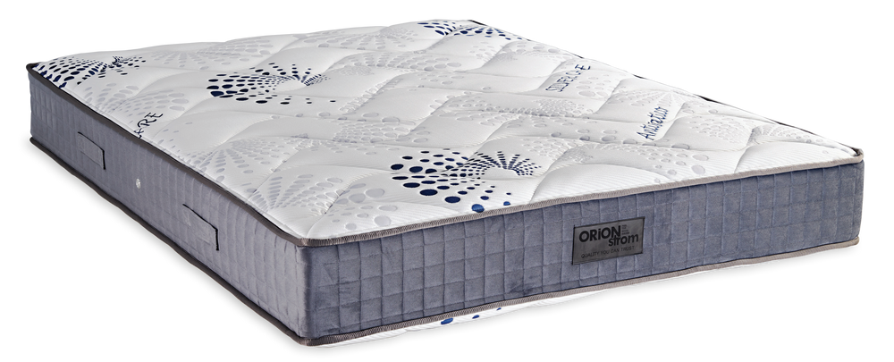 3011 Smart Silvercare Extra Plus — Angled view: white quilted top with blue motifs and a grey border. Feel: medium-firm. Orthopaedic mattress.
