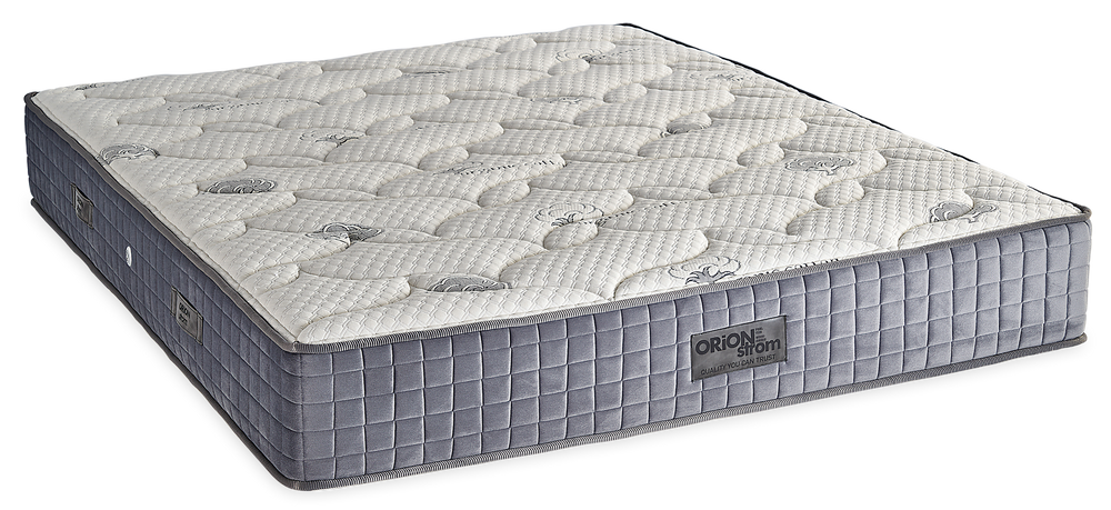 309 Smart Organic Cotton Extra Plus Coco — Angled view: white geometric quilting and a grey border with vertical stitching. Feel: very firm. Orthopaedic mattress.