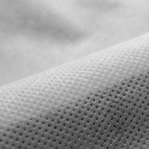 Λευκό ύφασμα NON WOVEN 15gr, διαθέσιμο σε πλάτη 160cm, 215cm και 240cm, για εσωτερικές φόδρες και επενδύσεις επίπλων.