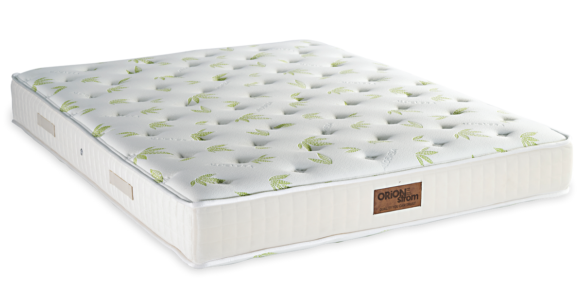 533 Comfort Aloe Vera Hyper Soft HR — Angled view: white quilted surface with green botanical motifs and a light-coloured border. Feel: medium-soft. Orthopaedic mattress.