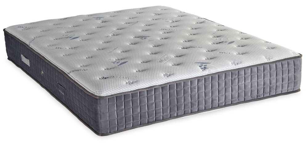 562 Comfort Silvercare Cotton Latex Memory Gel Tablet — Angled view: white textured quilting and a grey fabric border with vertical stitching. Feel: medium. Orthopaedic mattress.