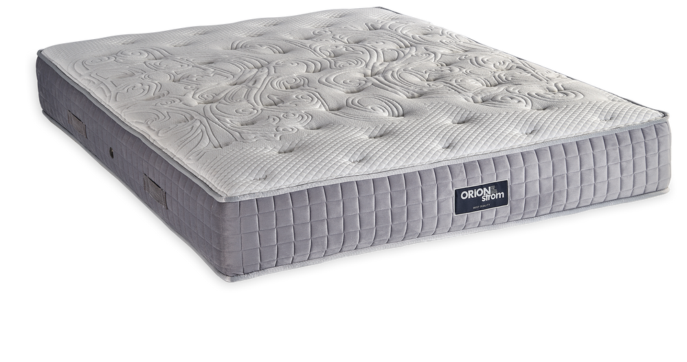 575 Comfort Luxury Cotton Royal Latex Wool Mini Bonnell — Angled view: white top with wave-shaped stitching and a grey quilted border. Feel: medium. Orthopaedic mattress.