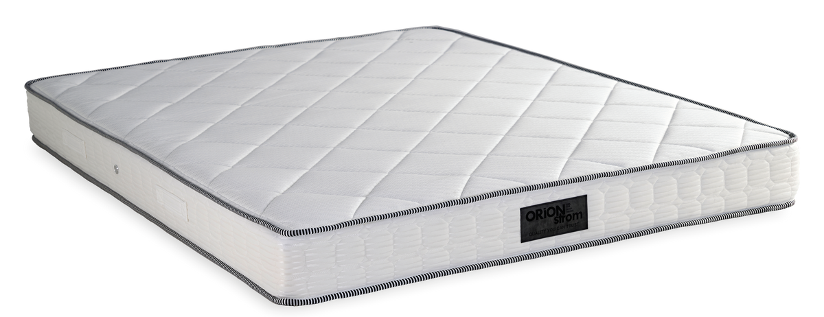 7007 Filoxenia Best Basic — Angled view: white top with geometric stitching and a light-coloured fabric border. Feel: medium. Orthopaedic mattress.