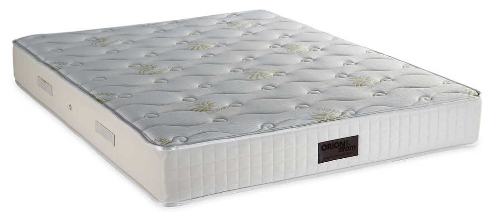 717 Filoxenia Aloe Vera Cotton HR Coco — Angled view: light-coloured quilted top with a subtle printed pattern and a cream border. Feel: very firm. Orthopaedic mattress.