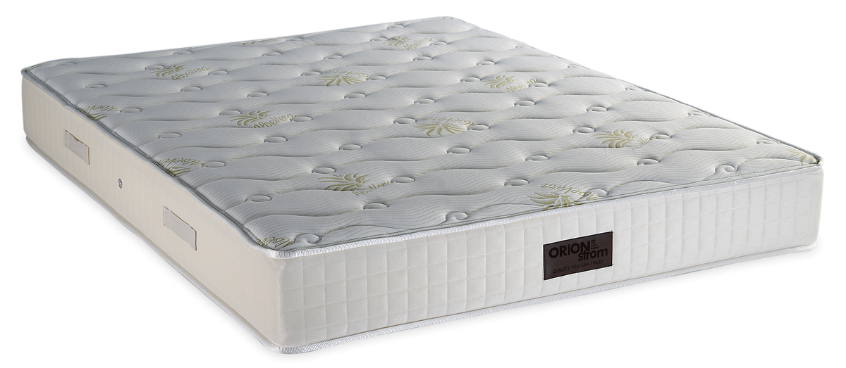 719 Filoxenia Aloe Vera Cotton HR Hyper Soft Coco — Angled view: light-coloured quilted top with a subtle printed pattern and a cream border. Feel: medium-firm. Orthopaedic mattress.
