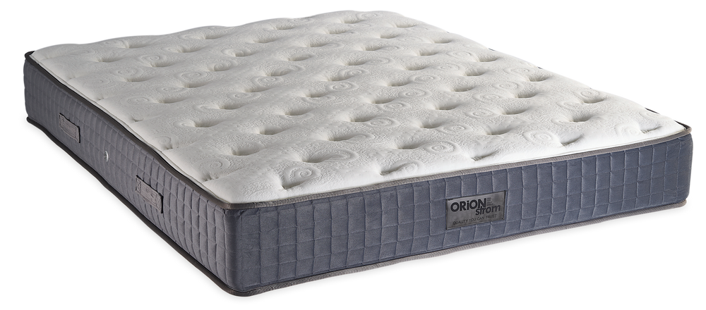730 Filoxenia Paris Hyper Soft Plus — Angled view: white deeply quilted top and a grey border with vertical stitching. Feel: medium. Orthopaedic mattress.