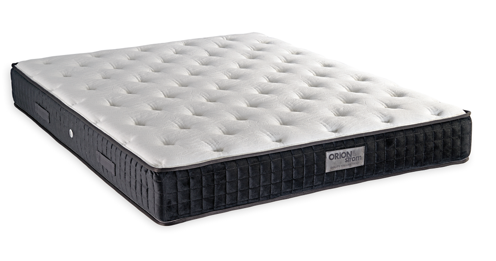 735 Filoxenia Silk Cool Max Hyper Soft Plus — Angled view: white deeply quilted top and a black border. Feel: medium. Orthopaedic mattress.