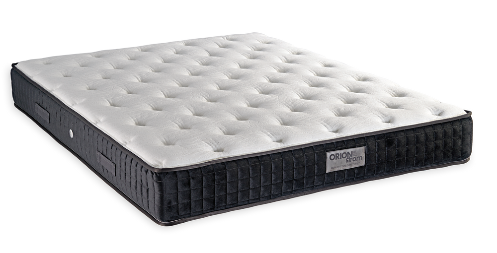736 Filoxenia Silk Cool Max Hyper Soft Coco — Angled view: white deeply quilted top and a black border. Feel: medium-firm. Orthopaedic mattress.