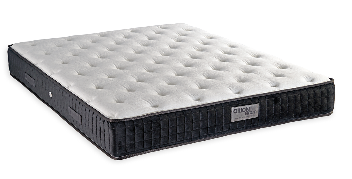 737 Filoxenia Silk Cool Max Hyper Soft Special — Angled view: white deeply quilted top and a black border. Feel: soft. Orthopaedic mattress.