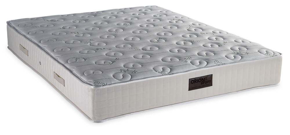 743 Filoxenia Bamboo Cotton Wool Afrolatex Plus — Angled view: light-coloured quilted top with circular motifs and stitched edges. Feel: medium. Orthopaedic mattress.
