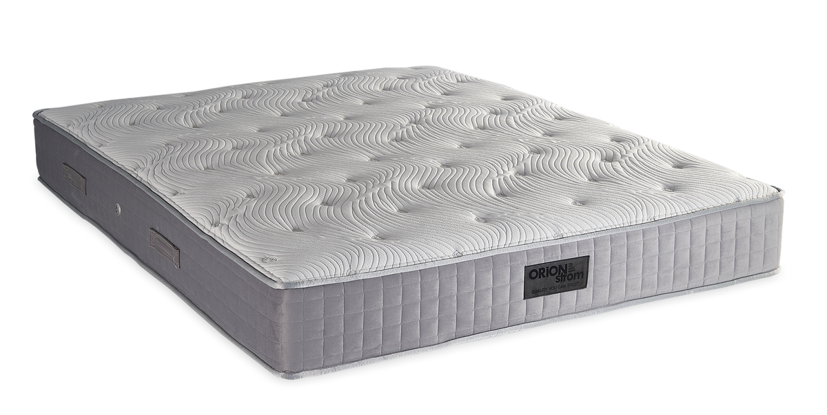 762 Filoxenia Hypnos Cotton Latex Memory Gel Tablet — Angled view: white textured quilting and a grey fabric border with vertical stitching. Feel: medium. Orthopaedic mattress.