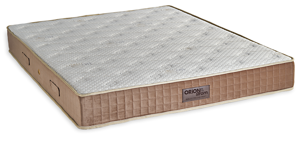 792 Filoxenia Bio Cotton Hyper Soft Plus Pocket — Angled view: white deeply quilted top and a brown border with vertical stitching. Feel: medium-soft. Anatomical mattress.