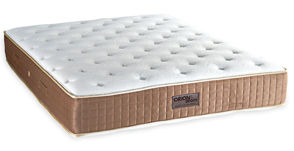 829 Filoxenia Space Memory Plus Pocket — Angled view: white deeply quilted top and a brown border with vertical stitching. Feel: soft. Anatomical mattress.