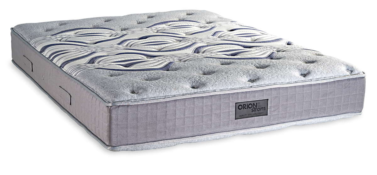 834 Filoxenia Dream Memory Tablet Pocket — Angled view: white textured quilting and a grey fabric border with vertical stitching. Feel: very soft. Anatomical mattress.