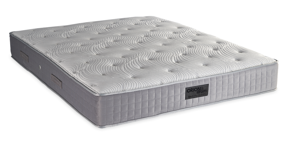 840 Filoxenia Hypnos Cotton Latex Memory Gel HR Orion Zone Pocket — Angled view: white textured quilting and a grey fabric border with vertical stitching. Feel: medium. Anatomical mattress.