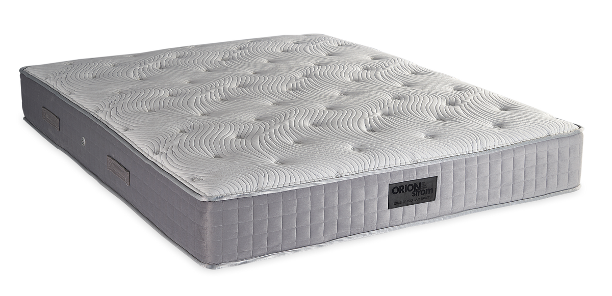 841 Filoxenia Hypnos Cotton Extra Latex Memory Gel Orion Zone Pocket — Angled view: white textured quilting and a grey fabric border with vertical stitching. Feel: medium. Anatomical mattress.