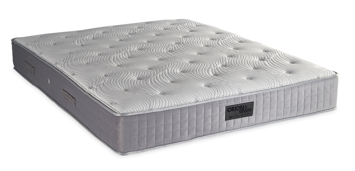 842 Filoxenia Hypnos Cotton Latex Memory Gel Tablet Orion Zone Pocket — Angled view: white textured quilting and a grey fabric border with vertical stitching. Feel: medium. Anatomical mattress.