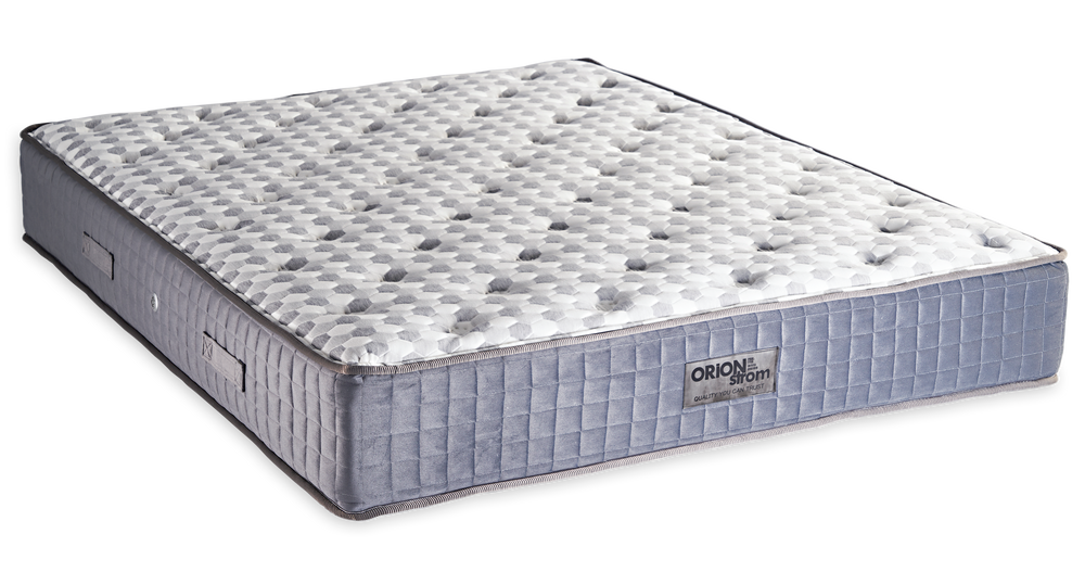 846 Filoxenia Mundial Cotton Extra Latex Tablet Orion Zone Pocket — Angled view: white textured quilting and a grey fabric border with vertical stitching. Feel: medium-soft. Anatomical mattress.