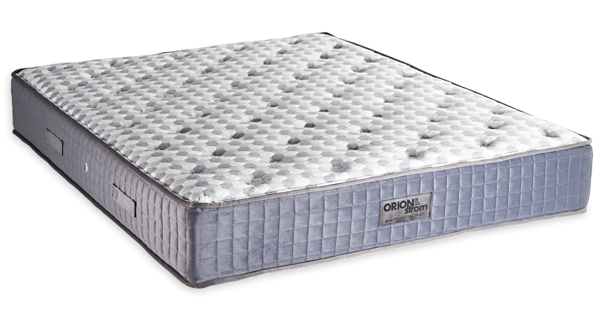 846 Filoxenia Mundial Cotton Extra Latex Tablet Orion Zone Pocket — Angled view: white textured quilting and a grey fabric border with vertical stitching. Feel: medium-soft. Anatomical mattress.