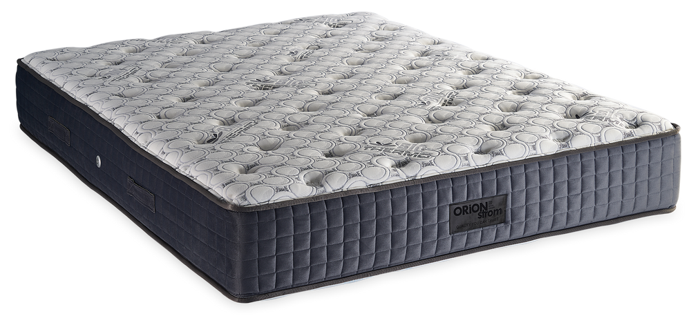 877 Filoxenia Bio Thermo Cotton Cool Max Hyper Soft Foam 5500 — Angled view: white textured quilting and a grey fabric border with vertical stitching. Feel: medium-soft. Anatomical mattress.