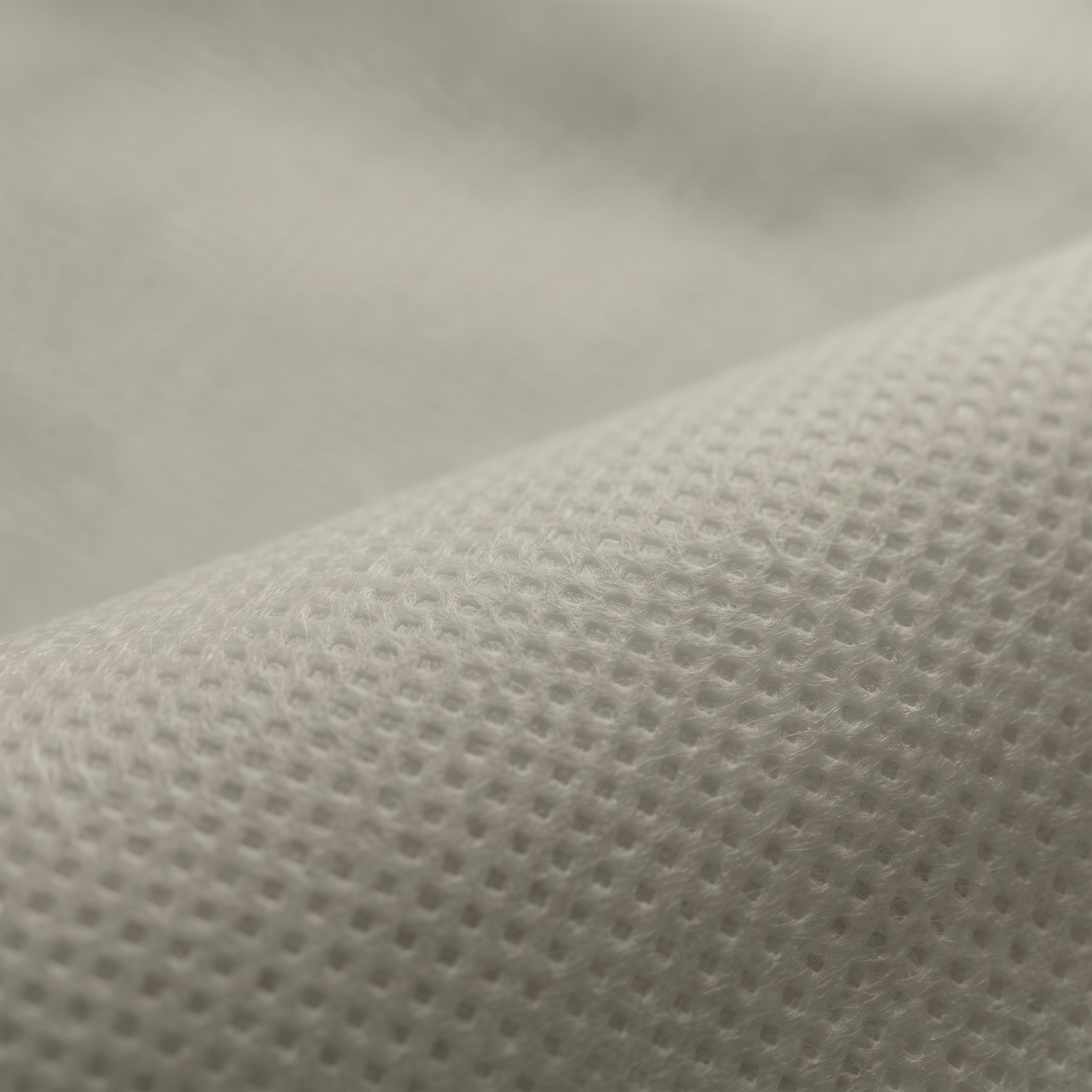Ύφασμα NON WOVEN 100gr σε γκρι, διαθέσιμο σε πλάτος 160cm, για ενισχυμένες επενδύσεις και διακοσμητικές κατασκευές.