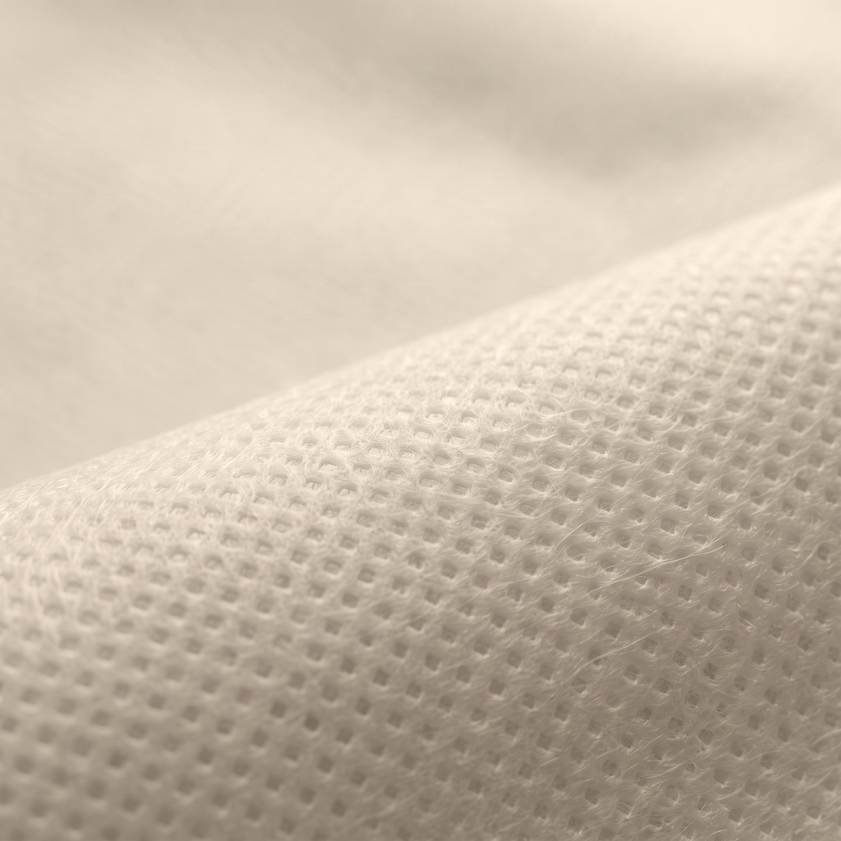 Non-woven 70 gr — Ύφασμα NON WOVEN 70gr σε ανοιχτό μπεζ, διαθέσιμο σε πλάτος 160cm, για επενδύσεις και διακοσμητικές εφαρμογές.