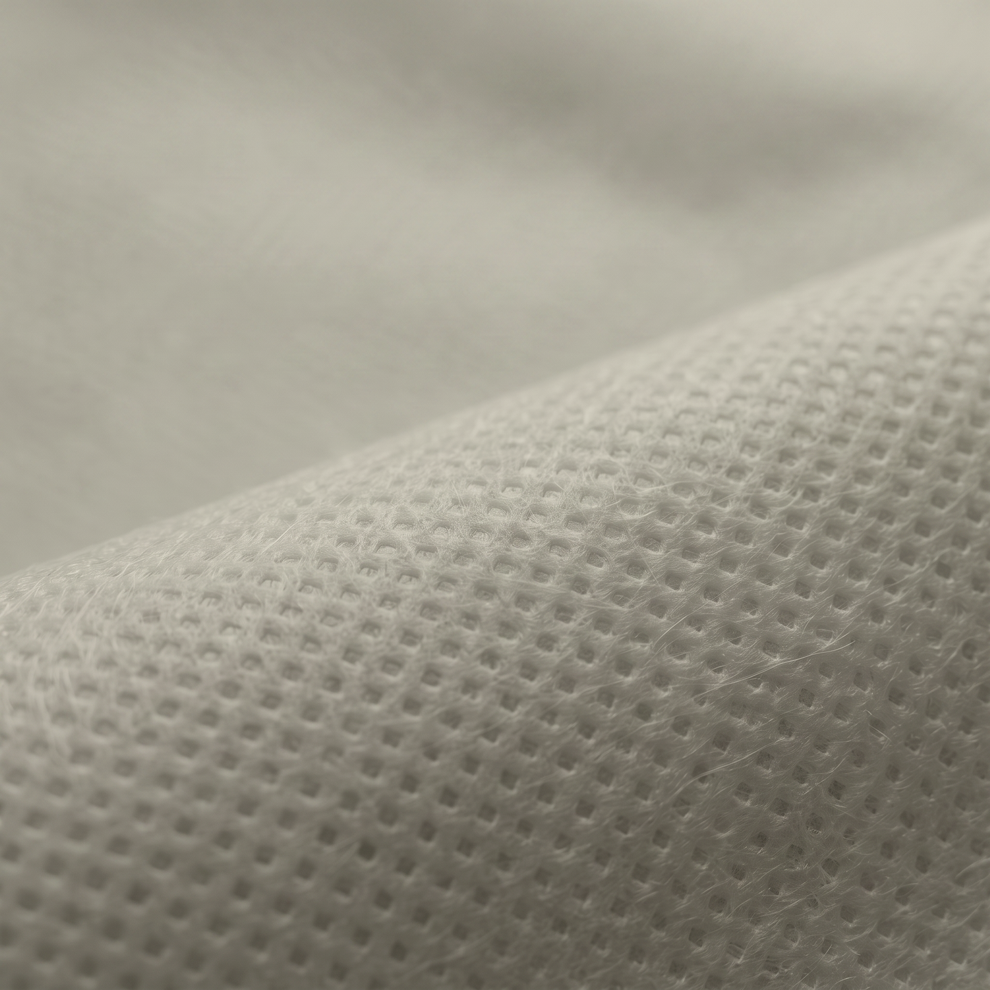 Ύφασμα NON WOVEN 70gr σε γκρι, διαθέσιμο σε πλάτος 160cm, για επενδύσεις και διακοσμητικές εφαρμογές.