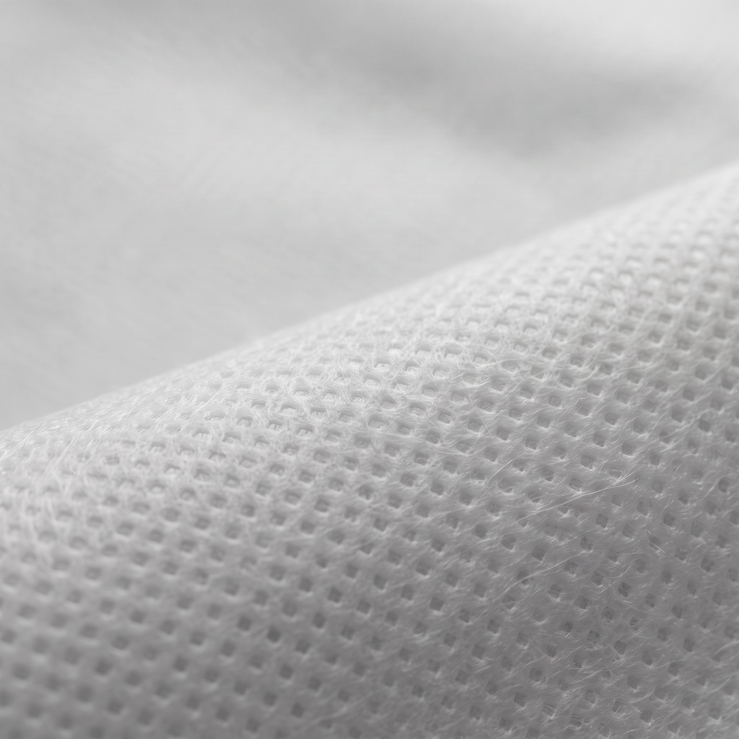 Ύφασμα NON WOVEN 70gr σε λευκό, διαθέσιμο σε πλάτη 90cm, 100cm και 160cm, για επενδύσεις και διακοσμητικές εφαρμογές.