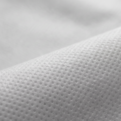 Ύφασμα NON WOVEN 70gr σε λευκό, διαθέσιμο σε πλάτη 90cm, 100cm και 160cm, για επενδύσεις και διακοσμητικές εφαρμογές.
