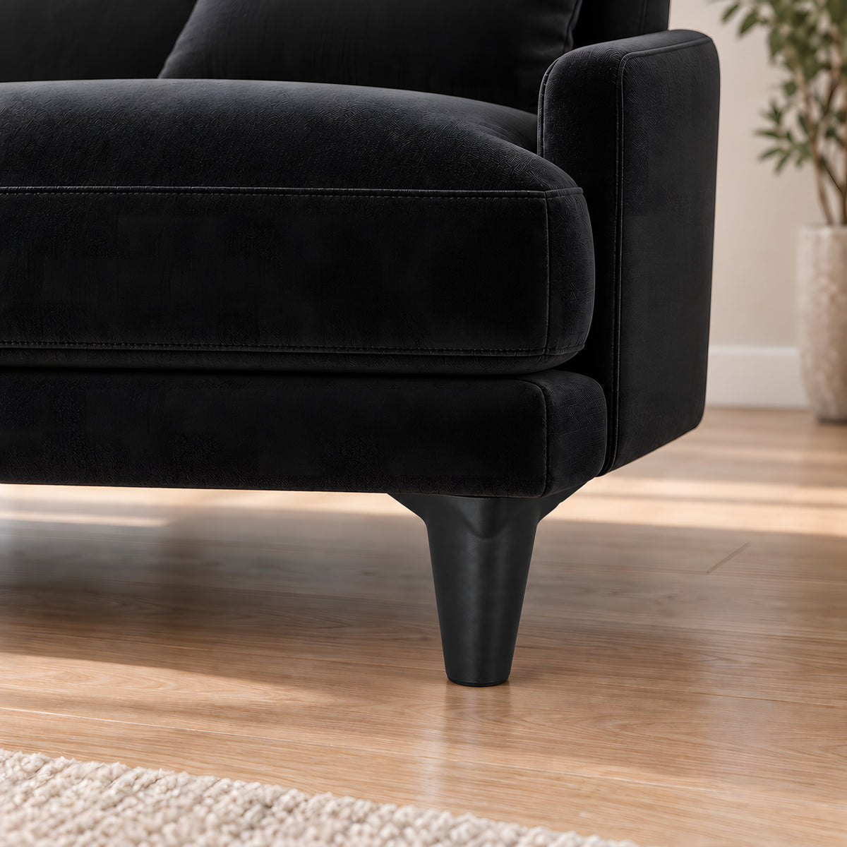 Plastic leg K08 black — Plastic leg K08 black · on a sofa, living room