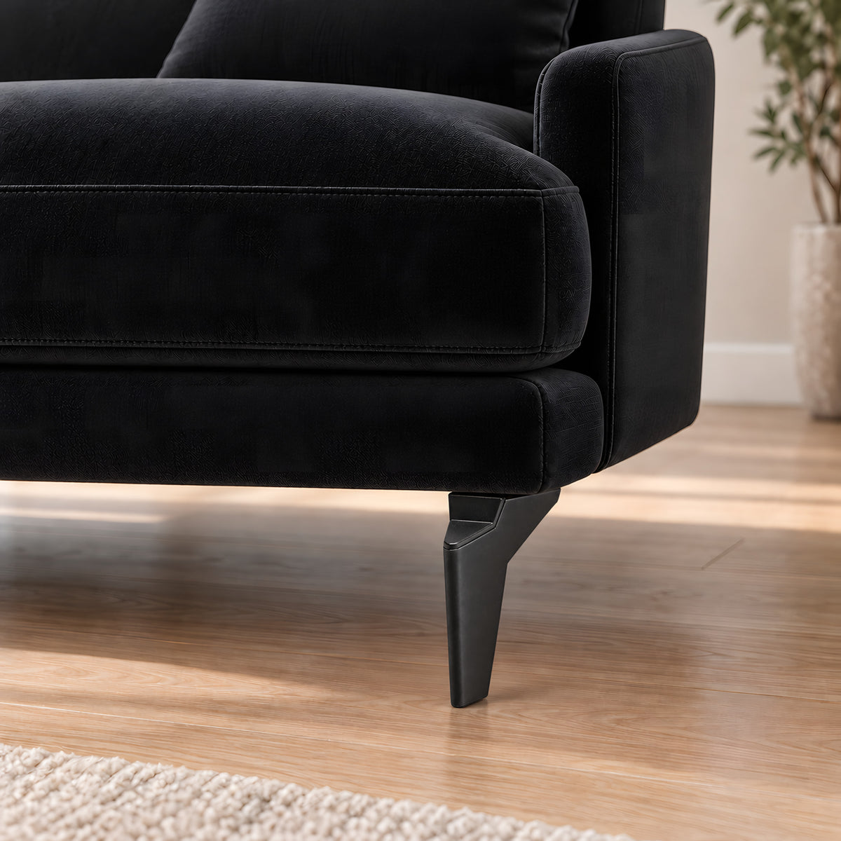 Plastic leg K10 black — Plastic leg K10 black · on a sofa, living room