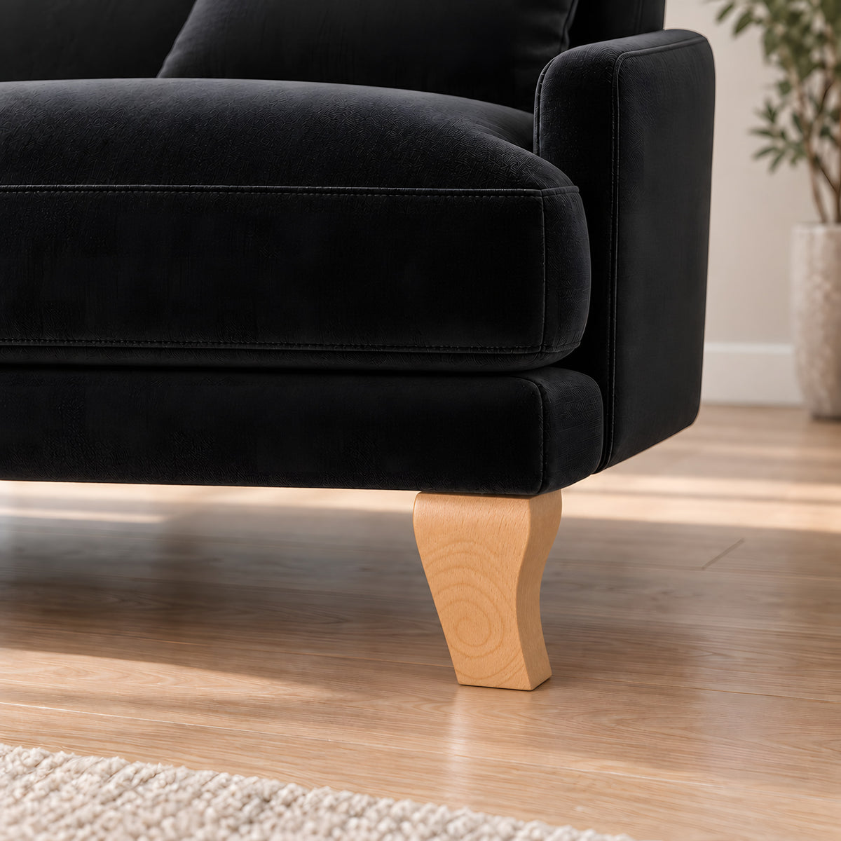 Wooden leg 310 — Wooden leg 310 · on a sofa, living room