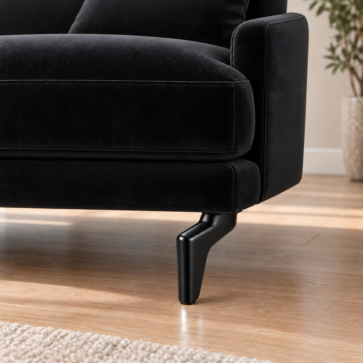 Metal leg S 46 12 cm black — Metal leg S 46 12 cm black · on a sofa, living room